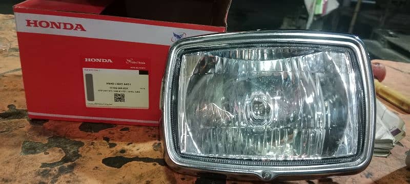 original head light Honda 125 salf start 1