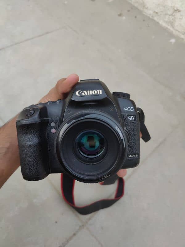 DSLR canon 5d mark ii with 50. mm 3