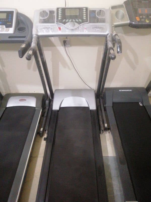 treadmils. (0329 4545517). gym cycles. dumbles. ellapticals. spin bike 5