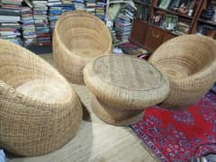 cane chairs and table