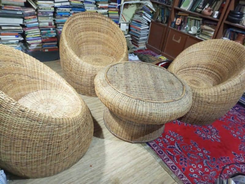 cane chairs and table 0