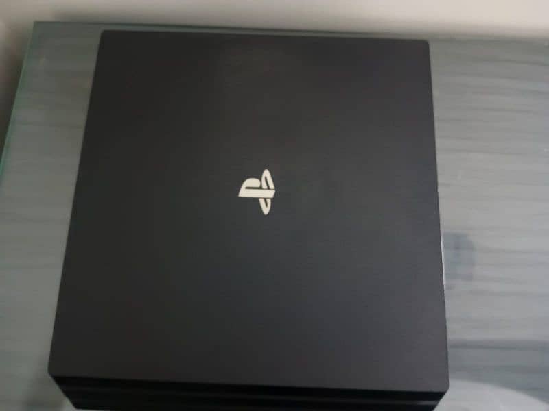 Selling my PS4 pro with one controller 0