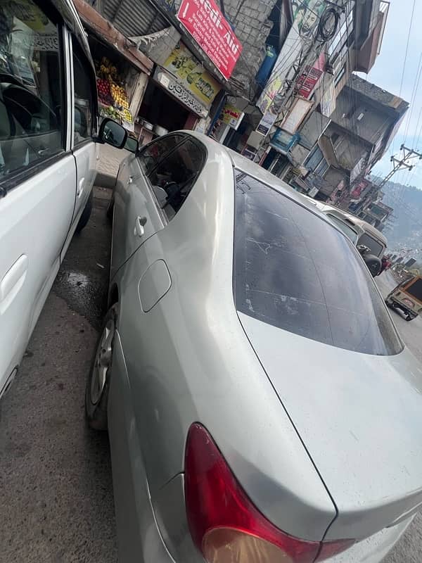 Toyota Corolla Altis 2006 urgent for sale or exchange with mehran car 4