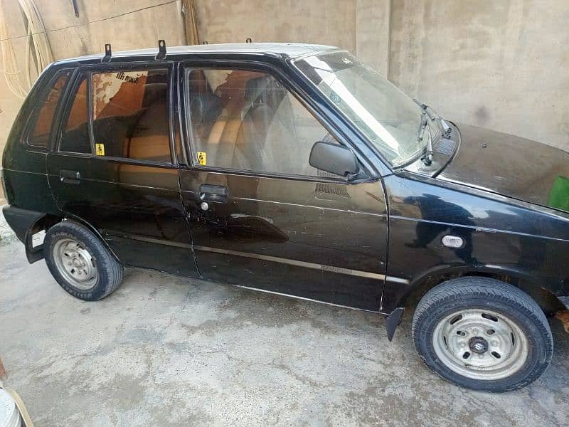 Suzuki Mehran VX 2012 yellow scheme 5