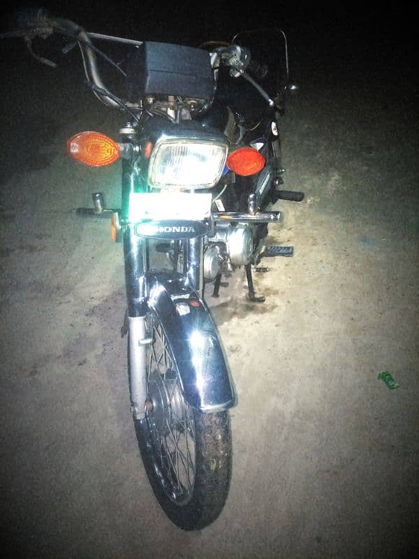 10/10 condition Honda 70 2006 model 0