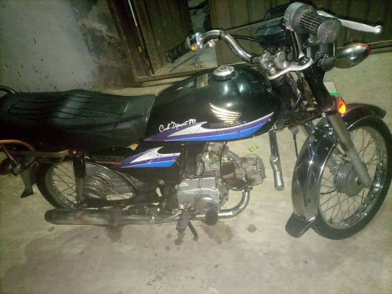 10/10 condition Honda 70 2006 model 2