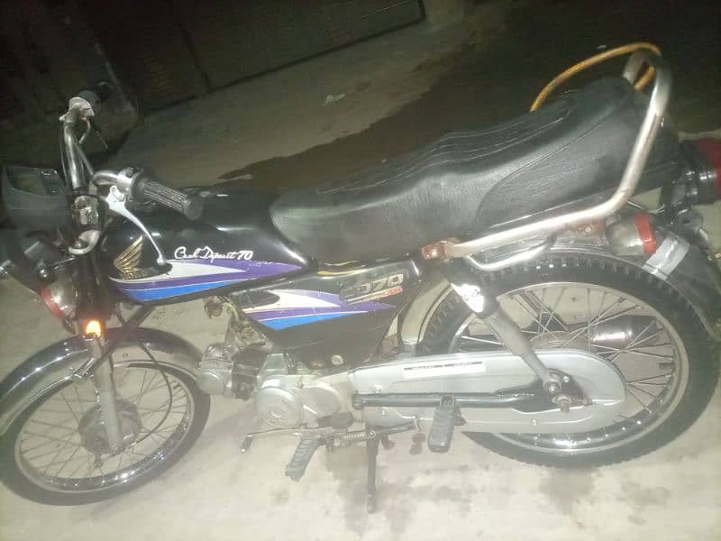 10/10 condition Honda 70 2006 model 5