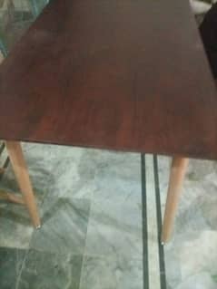 imported dining table and a consoul