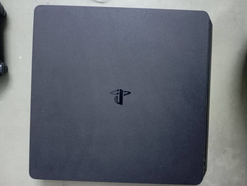 PS4 slim 500gb version12.00 with FIFA 23 and 2k18 0