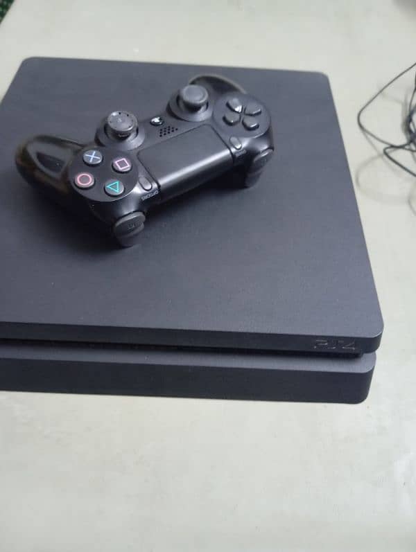 PS4 slim 500gb version12.00 with FIFA 23 and 2k18 1