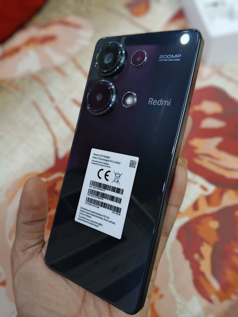 Redmi note 13 pro 8/256 box open 11 month worantyy contact 03161142266 6