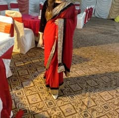 red saree with golden blouse