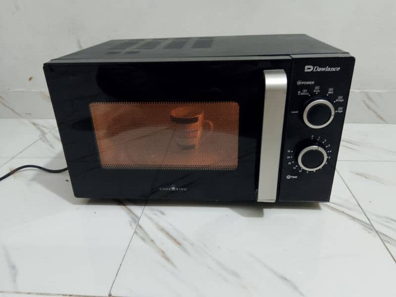 Dawlance microwave oven lerge size neat and clean condition 0