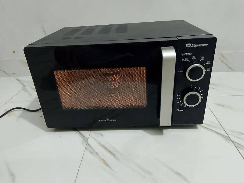 Dawlance microwave oven lerge size neat and clean condition 1