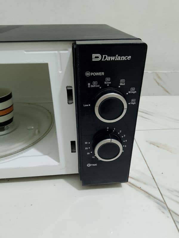 Dawlance microwave oven lerge size neat and clean condition 3