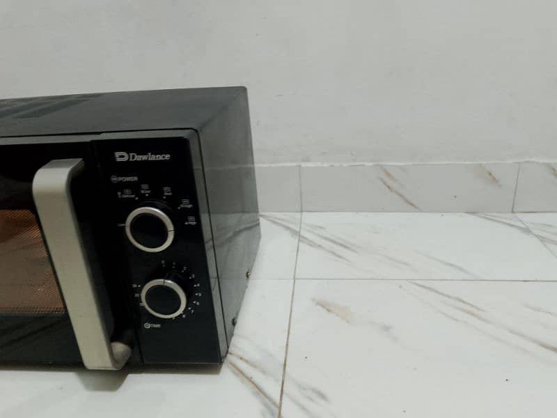 Dawlance microwave oven lerge size neat and clean condition 4