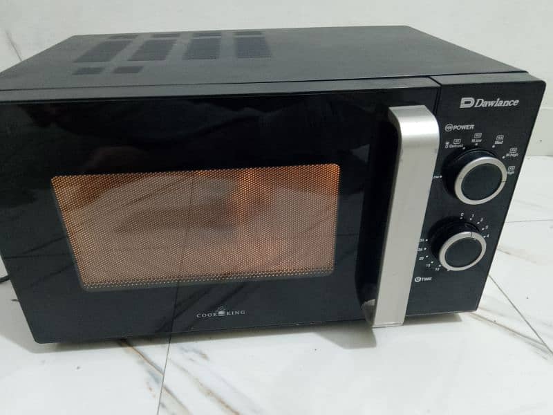 Dawlance microwave oven lerge size neat and clean condition 5