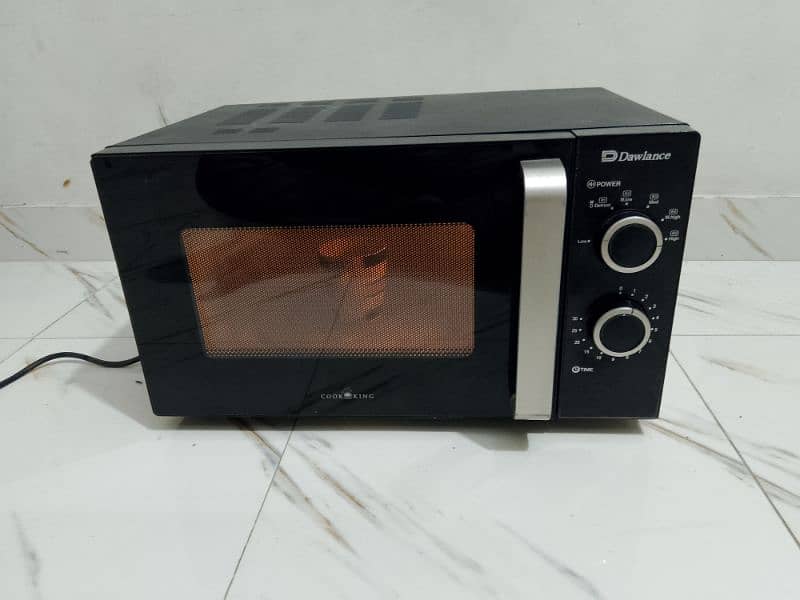 Dawlance microwave oven lerge size neat and clean condition 7