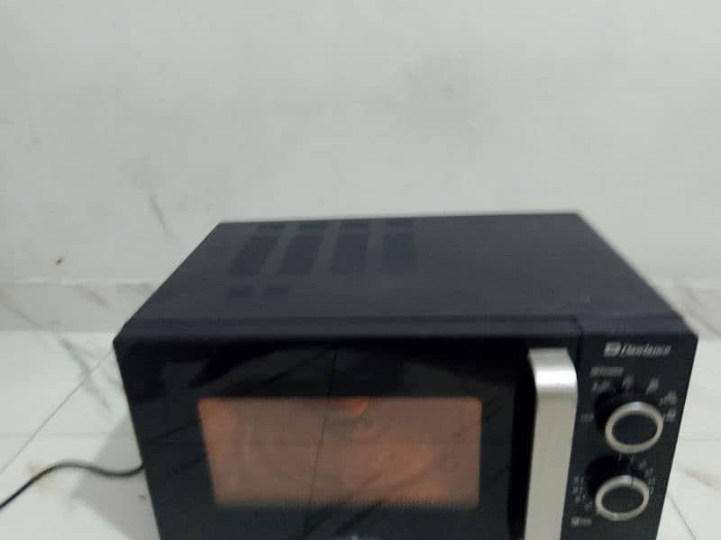 Dawlance microwave oven lerge size neat and clean condition 8