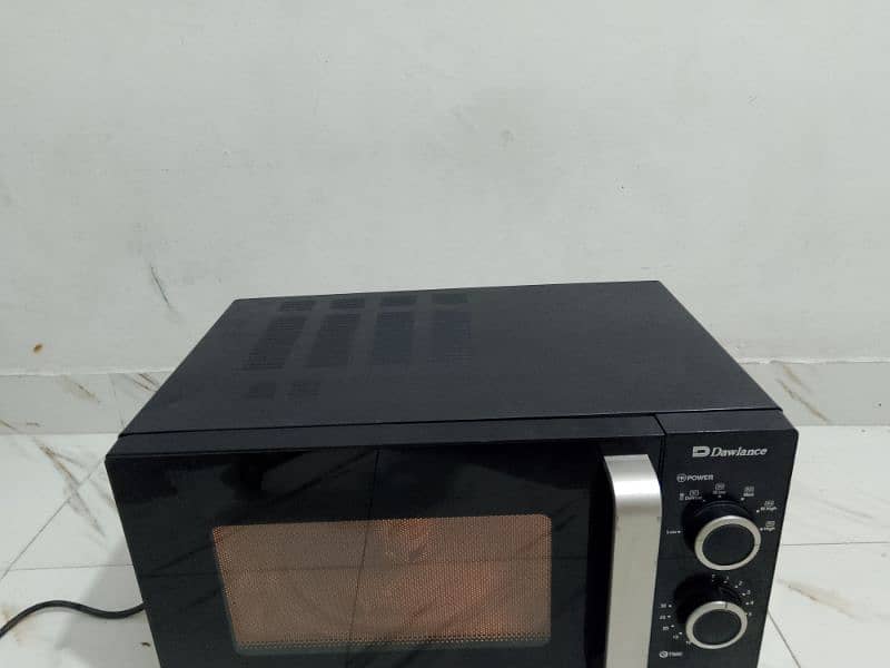 Dawlance microwave oven lerge size neat and clean condition 9