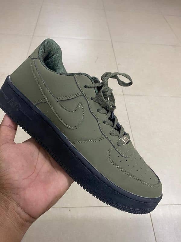 olive green Nike jordans 0