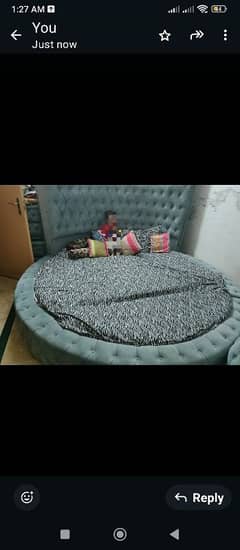 round bed with bedroom chairs