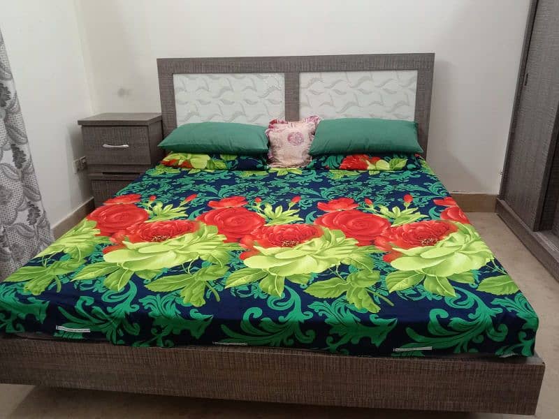 4 years used furniture bed with side tables,dressing table and almari 0