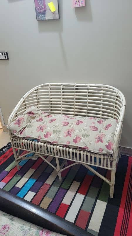 cane chairs and a tv unit 1