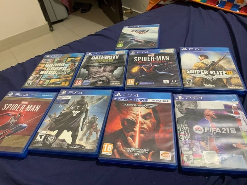 ps4 fat 500 gb with 2 controller and 9 game cds 1