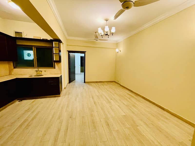 F-11 Markaz 2Bed 2 Bath TV Lounge Kitchen Car Parking Non-Furnished Apartment Available For Rent 1