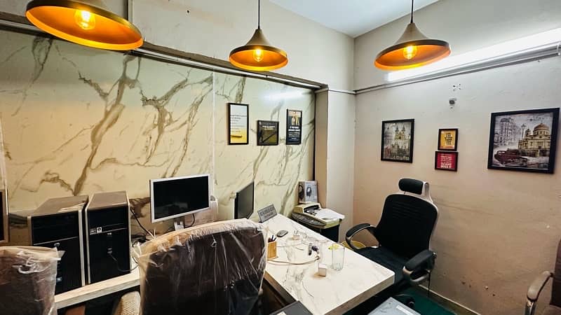 furnished office room 1