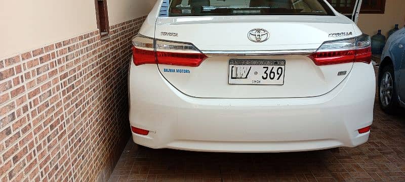 Toyota Corolla GLI model (end 2018) original white color 03328255887 1