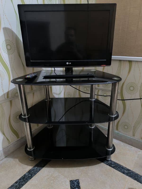 LG LCD 26" TV WITH TROLLEY. BEDROOM SET. 1