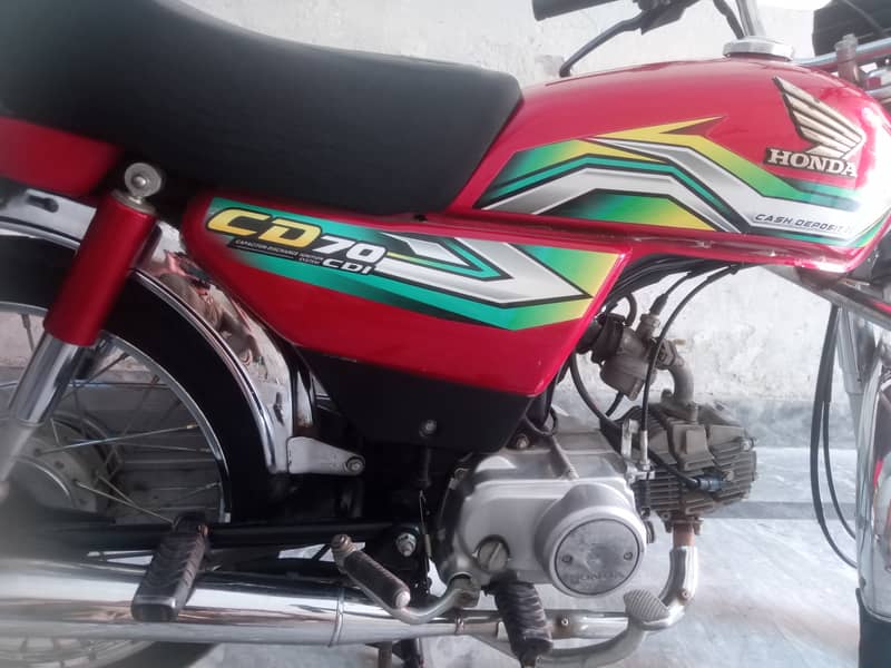 Honda 70 cc. red colour good condition all documents complete 0