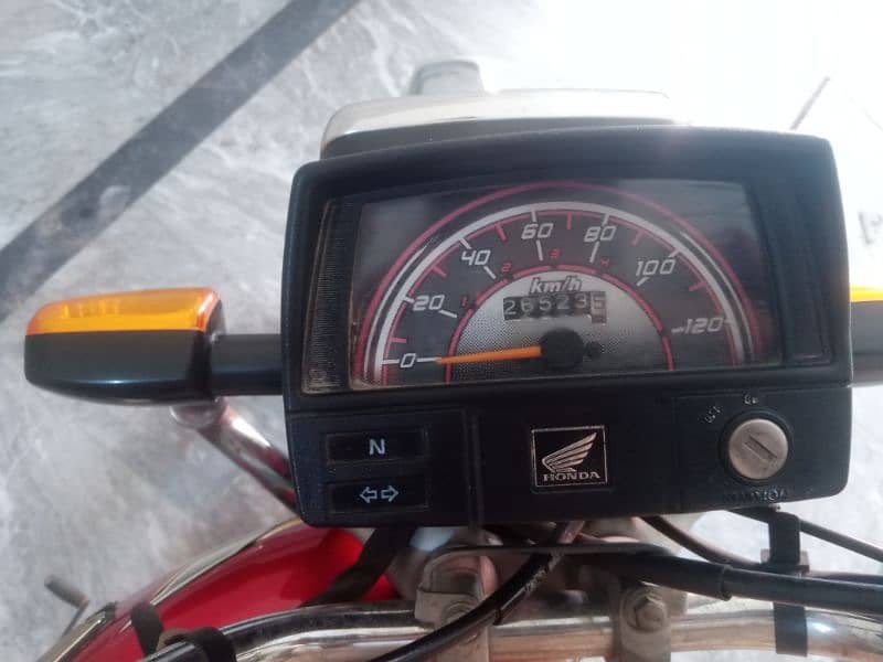 Honda 70 cc. red colour good condition all documents complete 1