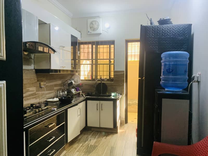 5 marla house for sale in johar town block C Tile flooring  Double kitchen  Double unit  Main apporced  Hot location 5