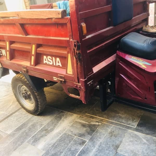 sale of New Asia loader. . 3