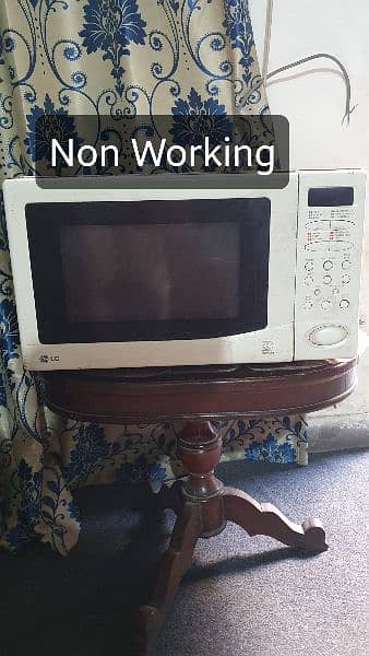 Full size LG microwave for urgent sale 0