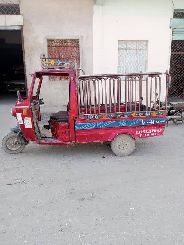 Loader covered Riksha 1