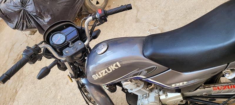 Suzuki 110 Karachi number first owner cplc clear 7