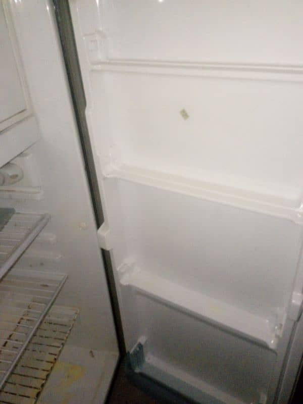 Dawlance small refrigerator for sale . like new condition. 100%working. 1