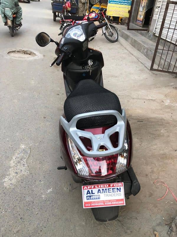 united 100cc petrol scooty 2024 1