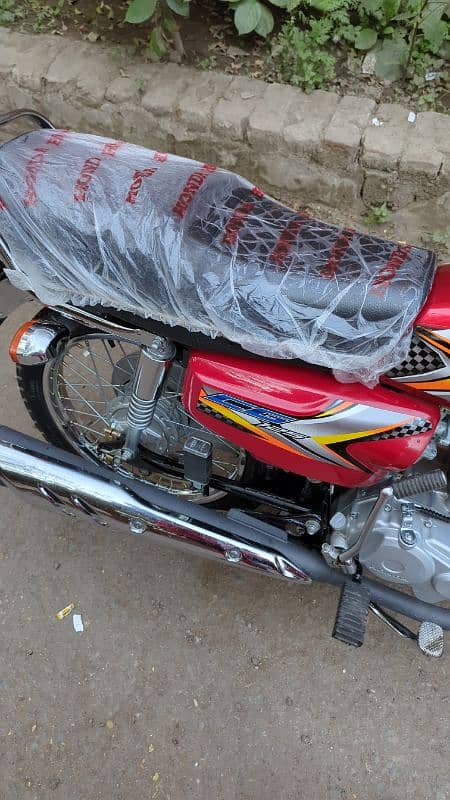 Applied 4 Honda 125 Red color open letter 10 10 new condition 1