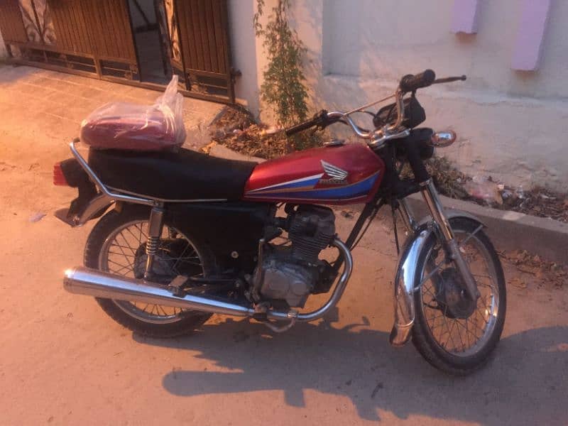 Honda 125 double Saman ke sath 4