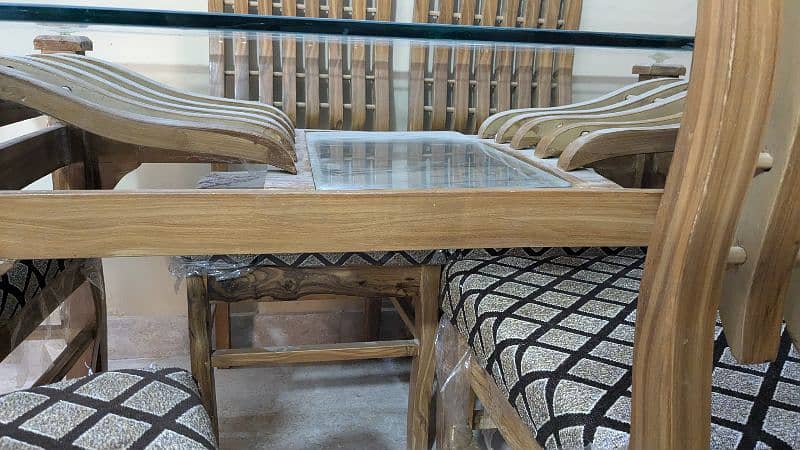 6 chairs glass dining table for sell 2