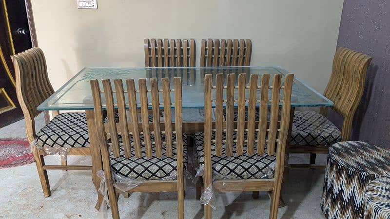 6 chairs glass dining table for sell 4