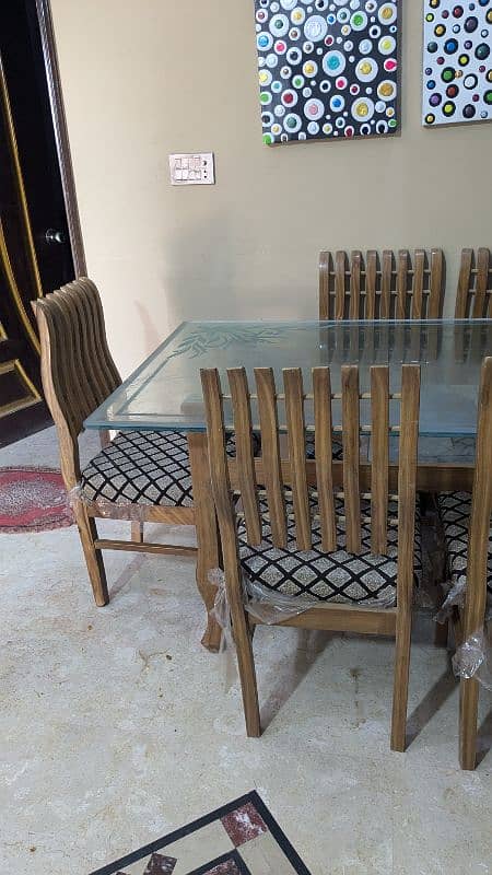 6 chairs glass dining table for sell 6