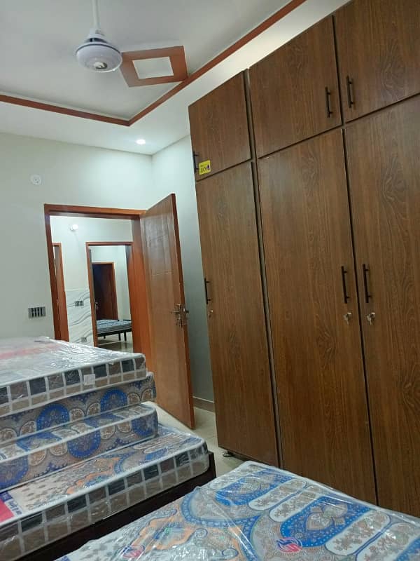 Running hostel building for rent setup for sale in Ali town near station hostels area profitable building 6