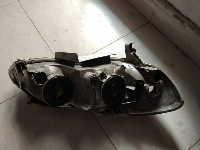 corolla xli 2007 model Headlights only cover 2