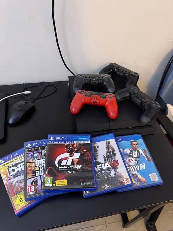 Ps4 with controllers and games 1